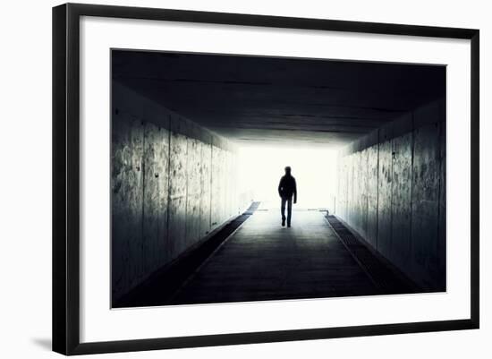 Silhouette Of Man Walking In Tunnel. Light At End Of Tunnel-Gladkov-Framed Art Print