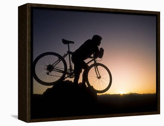 Silhouette of Mountain Biker at the Summit During Sunrise-null-Framed Premier Image Canvas