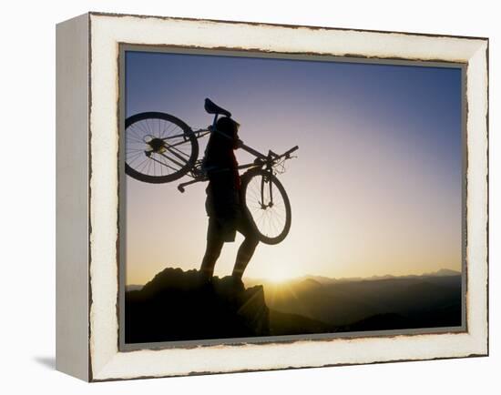 Silhouette of Mountain Biker at the Summit During Sunrise-null-Framed Premier Image Canvas