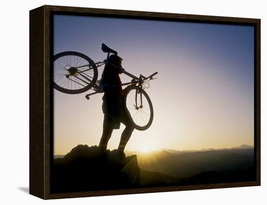 Silhouette of Mountain Biker at the Summit During Sunrise-null-Framed Premier Image Canvas