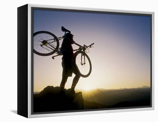 Silhouette of Mountain Biker at the Summit During Sunrise-null-Framed Premier Image Canvas