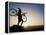 Silhouette of Mountain Biker at the Summit During Sunrise-null-Framed Premier Image Canvas