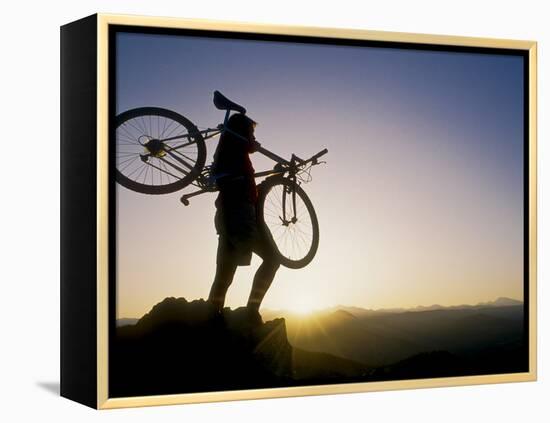 Silhouette of Mountain Biker at the Summit During Sunrise-null-Framed Premier Image Canvas