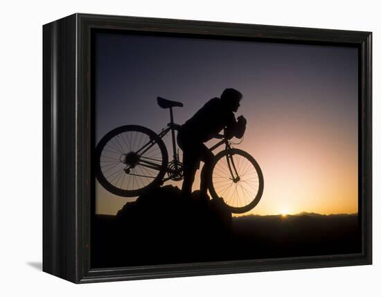 Silhouette of Mountain Biker at the Summit During Sunrise-null-Framed Premier Image Canvas