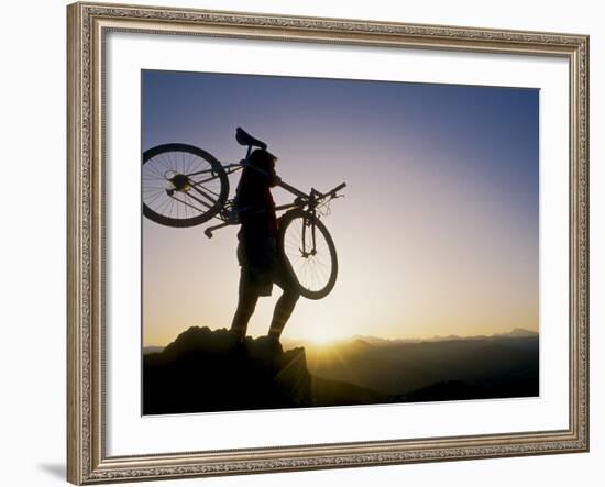 Silhouette of Mountain Biker at the Summit During Sunrise-null-Framed Photographic Print