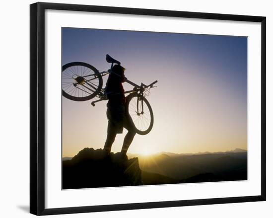 Silhouette of Mountain Biker at the Summit During Sunrise-null-Framed Photographic Print