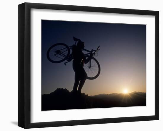 Silhouette of Mountain Biker at the Summit During Sunrise-null-Framed Photographic Print