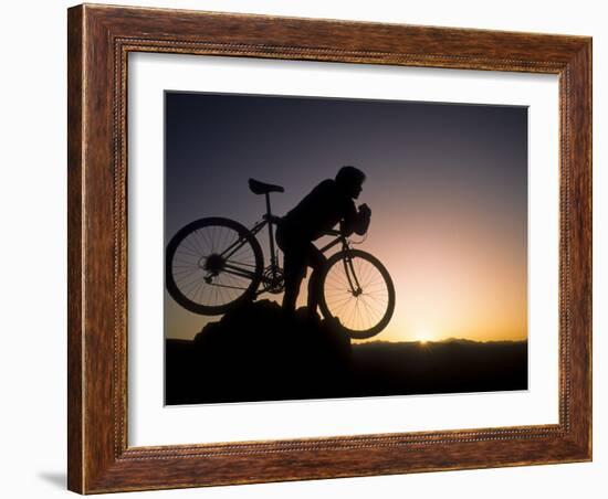 Silhouette of Mountain Biker at the Summit During Sunrise-null-Framed Photographic Print