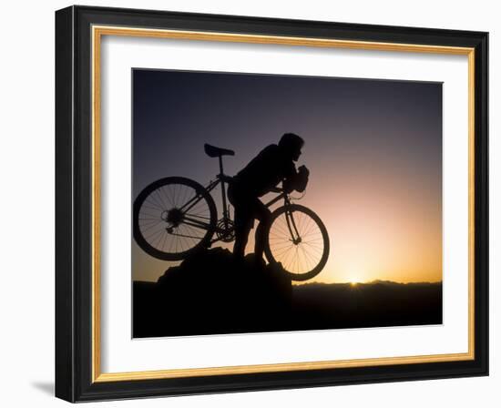 Silhouette of Mountain Biker at the Summit During Sunrise-null-Framed Photographic Print