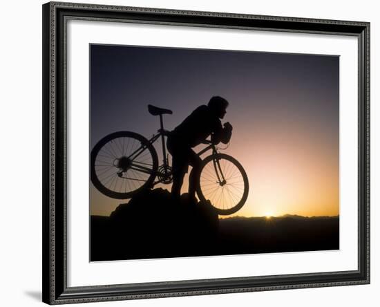 Silhouette of Mountain Biker at the Summit During Sunrise-null-Framed Photographic Print