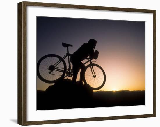 Silhouette of Mountain Biker at the Summit During Sunrise-null-Framed Photographic Print