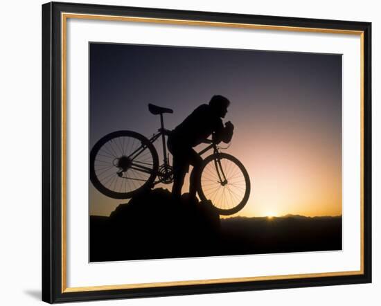 Silhouette of Mountain Biker at the Summit During Sunrise-null-Framed Photographic Print