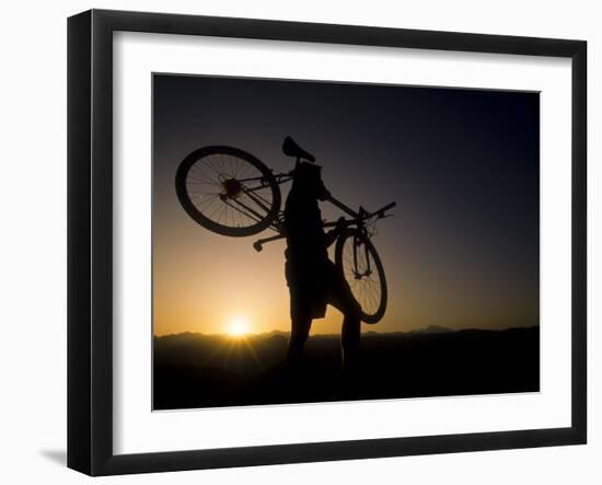 Silhouette of Mountain Biker at the Summit During Sunrise-null-Framed Photographic Print