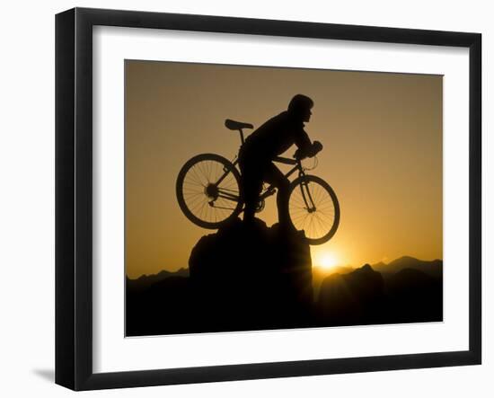 Silhouette of Mountain Biker at the Summit During Sunrise-null-Framed Photographic Print