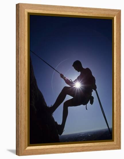 Silhouette of Rock Climber-null-Framed Premier Image Canvas