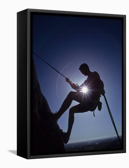 Silhouette of Rock Climber-null-Framed Premier Image Canvas