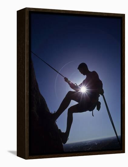 Silhouette of Rock Climber-null-Framed Premier Image Canvas