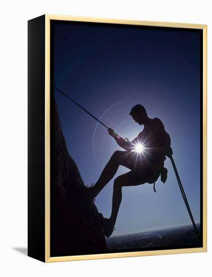 Silhouette of Rock Climber-null-Framed Premier Image Canvas