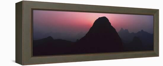 Silhouette of rock formations at dusk, Seven Star Park, Guilin, China-Panoramic Images-Framed Premier Image Canvas