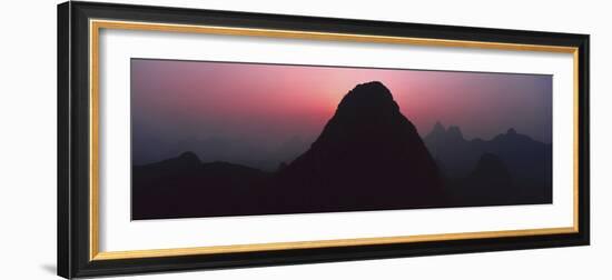 Silhouette of rock formations at dusk, Seven Star Park, Guilin, China-Panoramic Images-Framed Premium Photographic Print