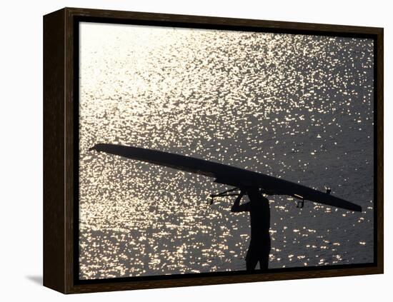 Silhouette of Rower Carrying His Boat, Vancouver Lake, Georgia, USA-null-Framed Premier Image Canvas