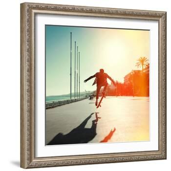 Silhouette of Skateboarder Jumping in City on Background of Promenade and Sea-Maxim Blinkov-Framed Photographic Print