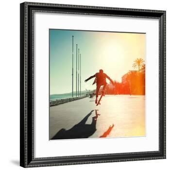 Silhouette of Skateboarder Jumping in City on Background of Promenade and Sea-Maxim Blinkov-Framed Photographic Print