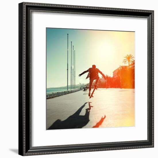 Silhouette of Skateboarder Jumping in City on Background of Promenade and Sea-Maxim Blinkov-Framed Photographic Print