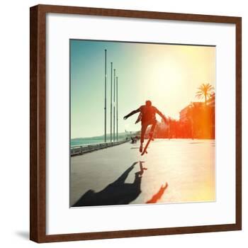 Silhouette of Skateboarder Jumping in City on Background of Promenade and Sea-Maxim Blinkov-Framed Photographic Print