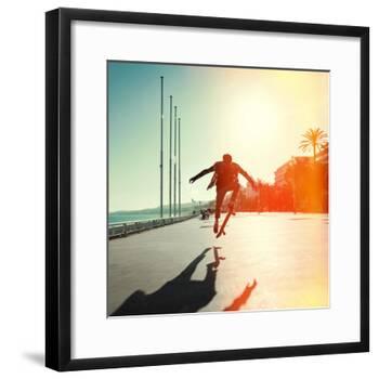 Silhouette of Skateboarder Jumping in City on Background of Promenade and Sea-Maxim Blinkov-Framed Photographic Print