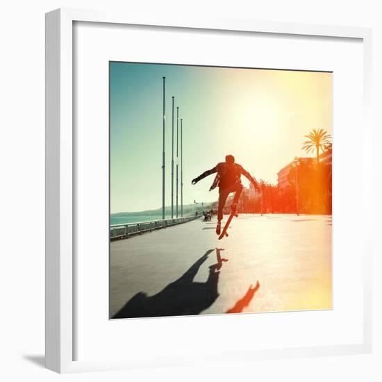 Silhouette of Skateboarder Jumping in City on Background of Promenade and Sea-Maxim Blinkov-Framed Photographic Print