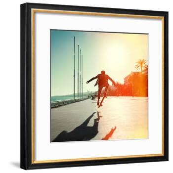 Silhouette of Skateboarder Jumping in City on Background of Promenade and Sea-Maxim Blinkov-Framed Photographic Print