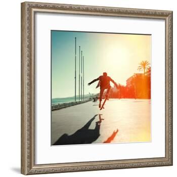 Silhouette of Skateboarder Jumping in City on Background of Promenade and Sea-Maxim Blinkov-Framed Photographic Print