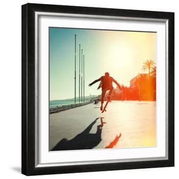 Silhouette of Skateboarder Jumping in City on Background of Promenade and Sea-Maxim Blinkov-Framed Photographic Print