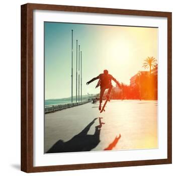 Silhouette of Skateboarder Jumping in City on Background of Promenade and Sea-Maxim Blinkov-Framed Photographic Print