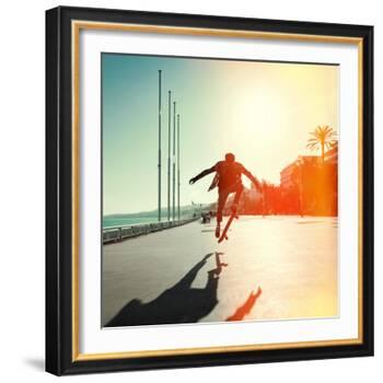Silhouette of Skateboarder Jumping in City on Background of Promenade and Sea-Maxim Blinkov-Framed Photographic Print