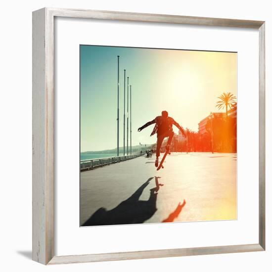 Silhouette of Skateboarder Jumping in City on Background of Promenade and Sea-Maxim Blinkov-Framed Photographic Print