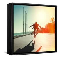 Silhouette of Skateboarder Jumping in City on Background of Promenade and Sea-Maxim Blinkov-Framed Stretched Canvas