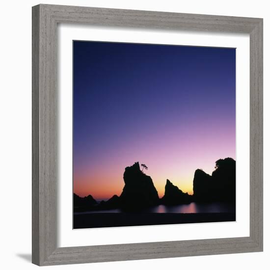 Silhouette of Stacks and Tree against Colorful Evening Sky-Micha Pawlitzki-Framed Photographic Print