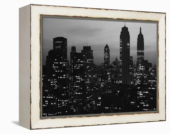 Silhouette of the Empire State Building and Other Buildings without Light During Wartime-Andreas Feininger-Framed Premier Image Canvas