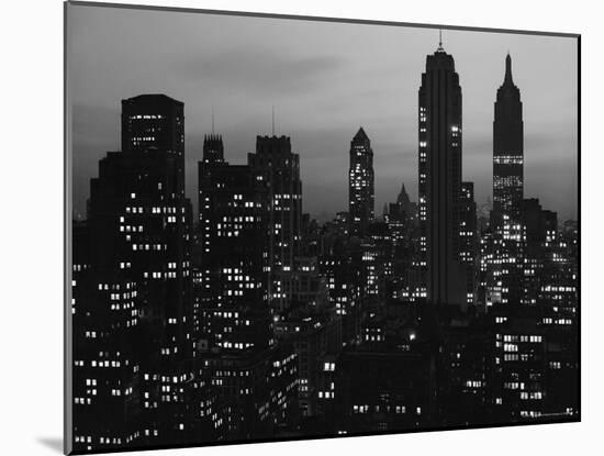 Silhouette of the Empire State Building and Other Buildings without Light During Wartime-Andreas Feininger-Mounted Photographic Print