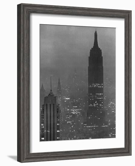 Silhouette of the Empire State Building and Other Buildings without Light During Wartime-Andreas Feininger-Framed Photographic Print