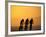 Silhouette of Three Men Riding on the Beach-Mitch Diamond-Framed Photographic Print