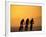 Silhouette of Three Men Riding on the Beach-Mitch Diamond-Framed Photographic Print