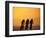 Silhouette of Three Men Riding on the Beach-Mitch Diamond-Framed Photographic Print