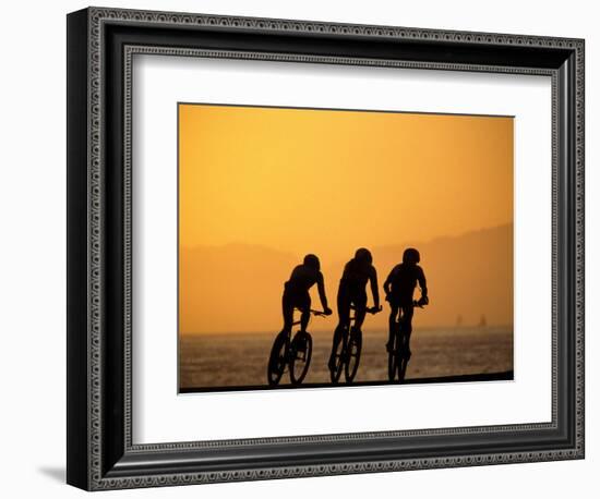 Silhouette of Three Men Riding on the Beach-Mitch Diamond-Framed Photographic Print