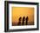 Silhouette of Three Men Riding on the Beach-Mitch Diamond-Framed Photographic Print