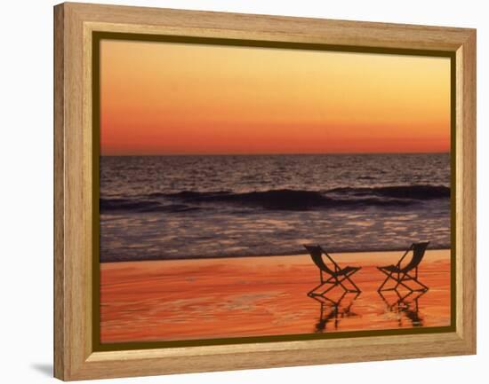 Silhouette of Two Chairs on the Beach-Mitch Diamond-Framed Premier Image Canvas