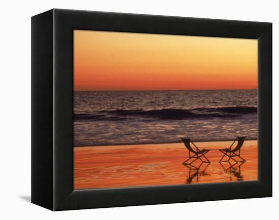 Silhouette of Two Chairs on the Beach-Mitch Diamond-Framed Premier Image Canvas