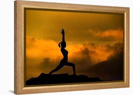 Silhouette of Woman Doing Yoga Meditation During Sunrise with Natural Golden Sunlight on Mountain-szefei-Framed Premier Image Canvas